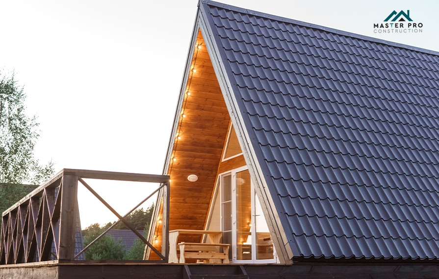 Modern A-frame home with clean, sustainable roofing design featuring a steep metal roof