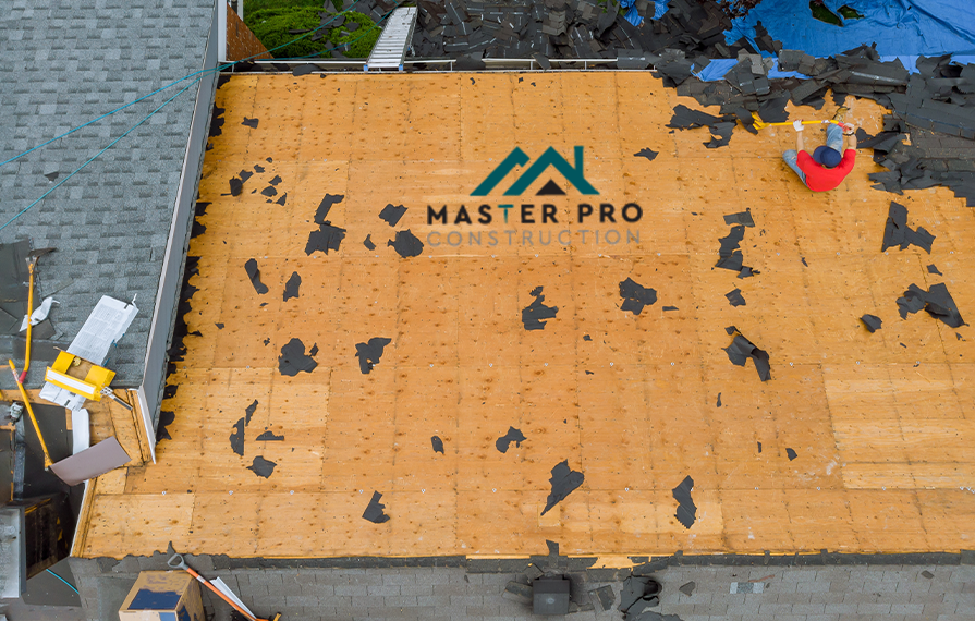 Roof repair team working on a North Jersey home showing craftsmanship and renovation progress by Master Pro Construction